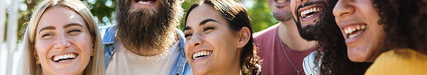 Group of happy friends smiling outdoors